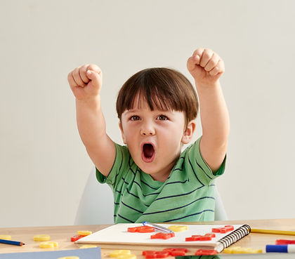Child excited in speech therapy