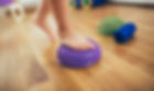 Child with motor delays receiving physical therapy services