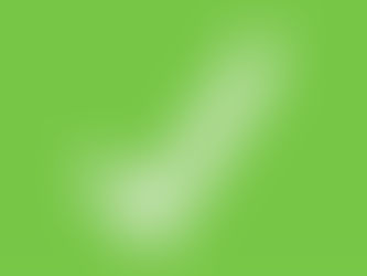 A white tick on a green background