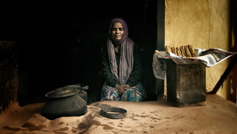 Young woman selling pakora