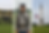 Triptych of Gettysburg Battlefield featuring a Civil War reenactor in Union uniform, a historic cannon set along a split-rail fence, and the Pennsylvania State Memorial surrounded by open fields and trees.