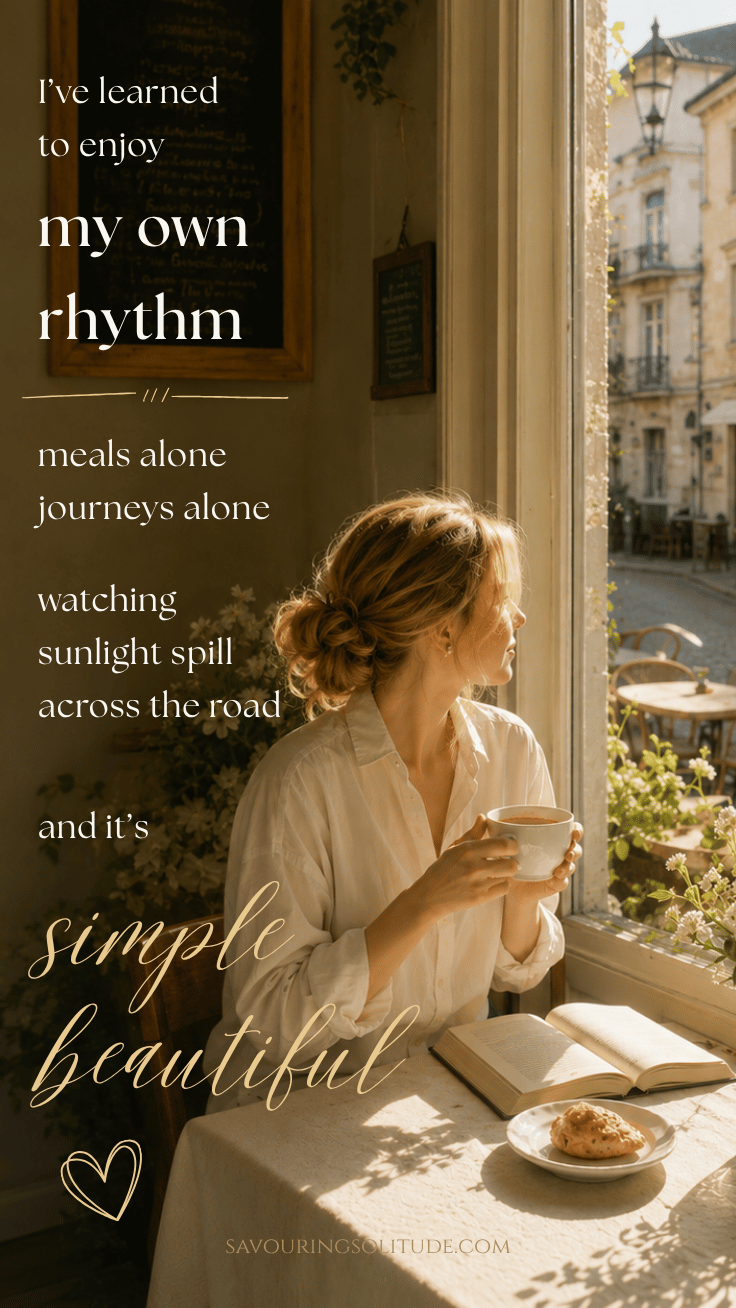 Woman at cafe window holding tea beside an open book and pastry; text says I’ve learned to enjoy my own rhythm, simple beautiful.