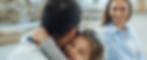 affectionate-little-girl-with-eyes-closed-embracing-her-father-home-mother-is-background.j