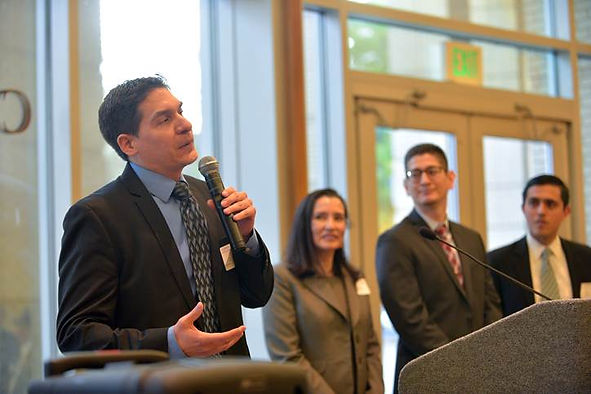 Sacramento Lawyer George Acero speaking at event in honor of retired Supreme Court Justice Cruz Reynoso