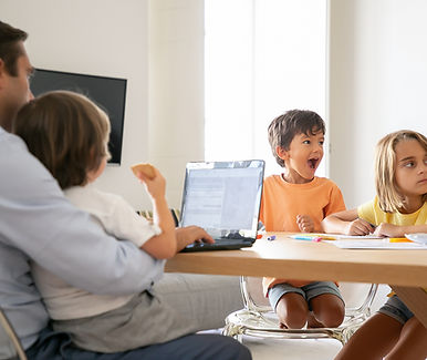 happy-kids-drawing-doodles-when-dad-working-laptop-holding-son-knees-exited-children-paint