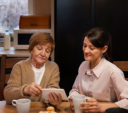 female-caretaker-with-client-home-doing-her-job.jpg