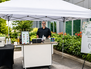 Mobile coffee and matcha bar setup under a white tent for an outdoor Seattle-area event.