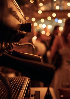 Mobile espresso cart serving guests at Seattle event by Filter & Shot Coffee Catering