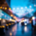 Out-of-focus city street lights at night, seattle coffee catering corporate events.