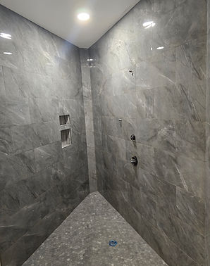 1 foot by 2 foot on walls and mosaic floor