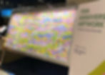 A 100-piece mosaic painting by Susan Pominville displayed at the Hope Scarves fundraiser, where each piece was sold to support metastatic breast cancer research.