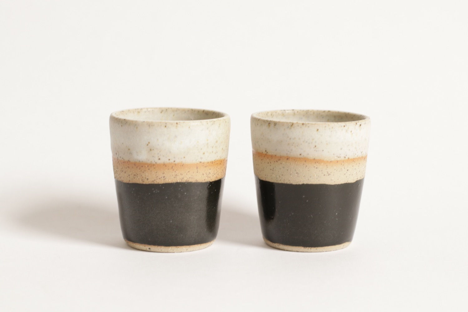 Black and white espresso cups