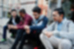Group of four sri lankan teen male students. Classmates spend time together.