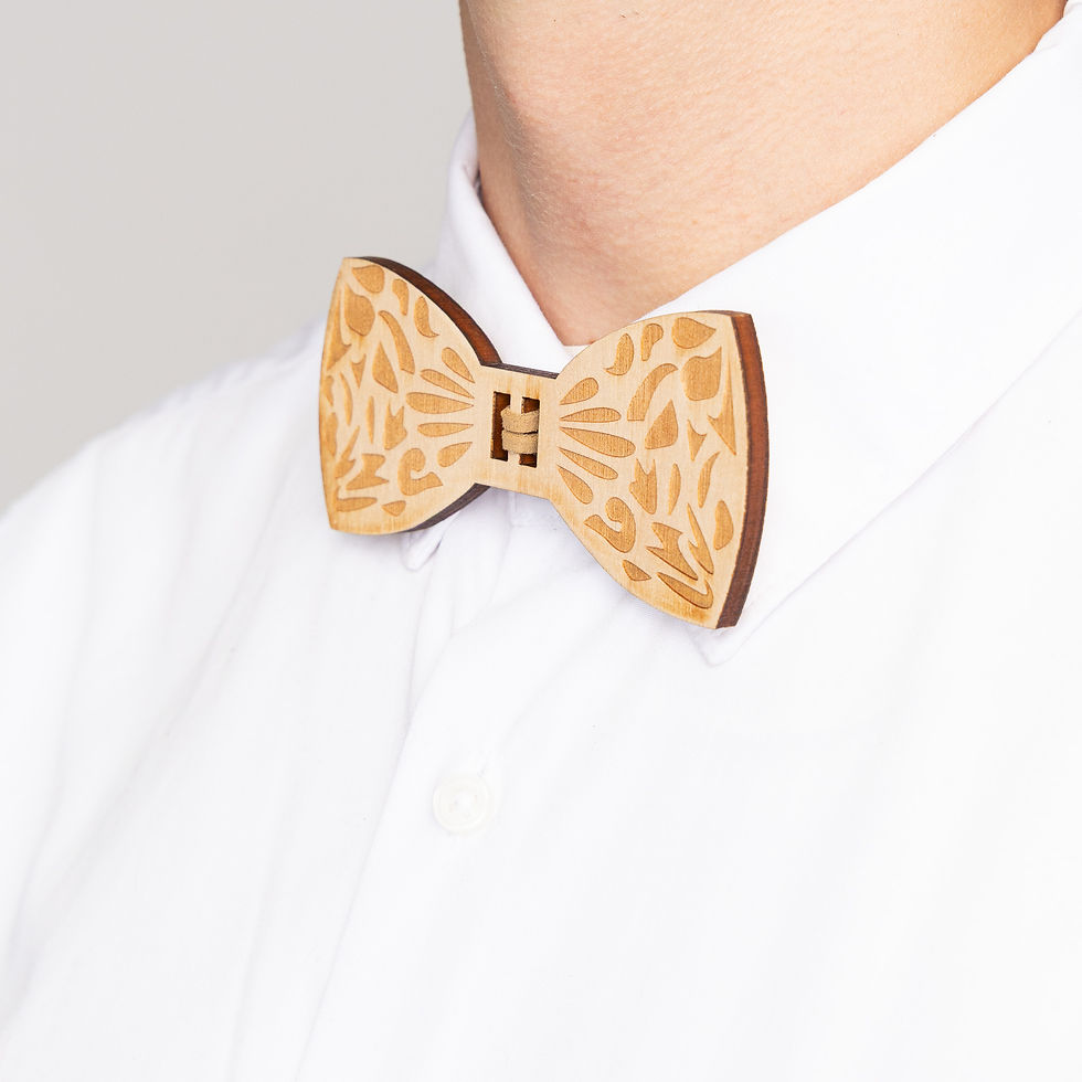 Thumbnail: Laser-engraved wooden bow tie with paisley pattern and tan faux suede center, designed by Daniel Roa side