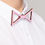 Thumbnail: Hand-painted pink triangle wooden bow tie referencing queer history and resistance, designed by Daniel Roa right side