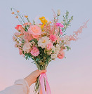 mayagi_The_image_captures_a_hand_holding