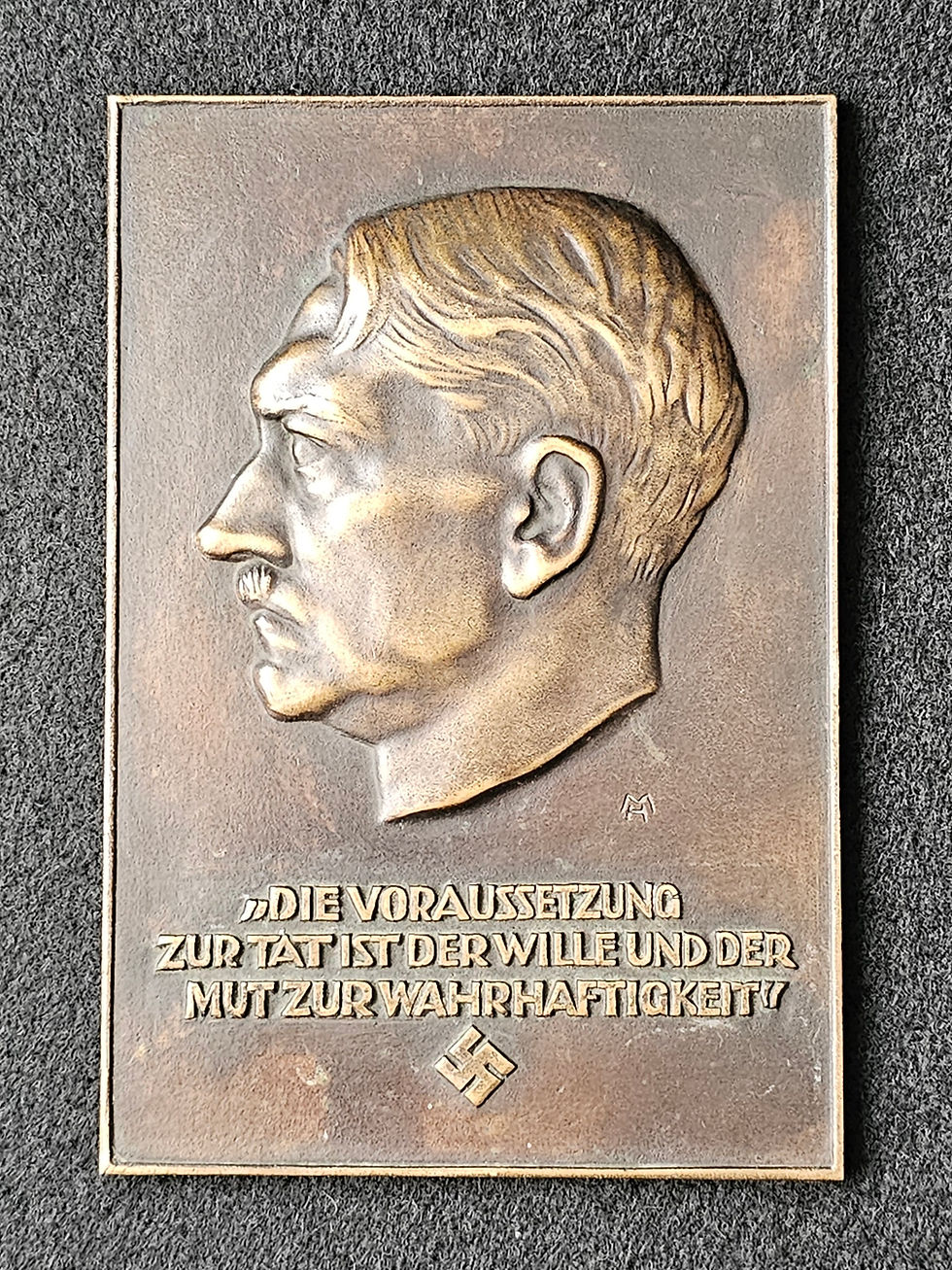 Bronzed Adolf Hitler plaque.