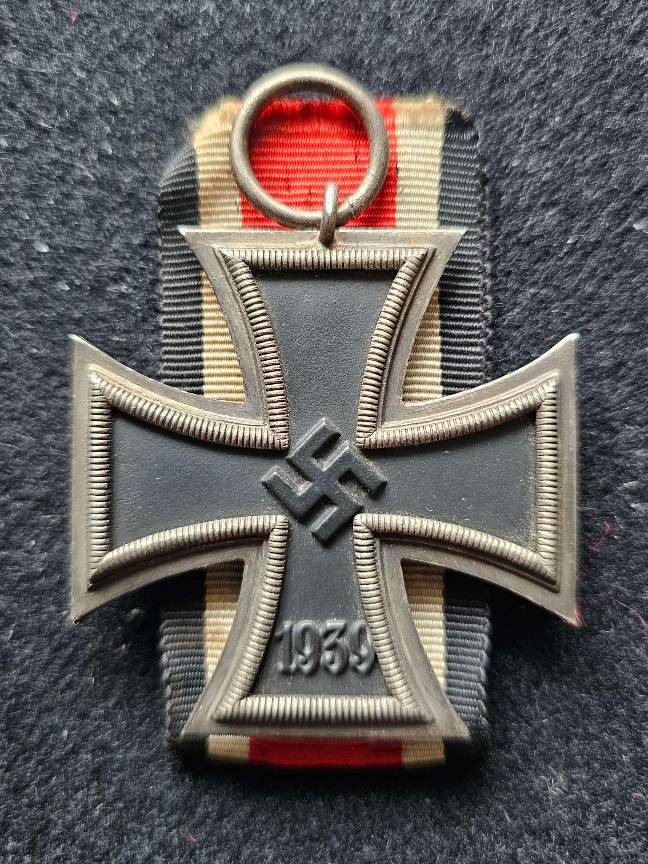 Iron cross 2nd class by Otto Schickle, not magnetic.