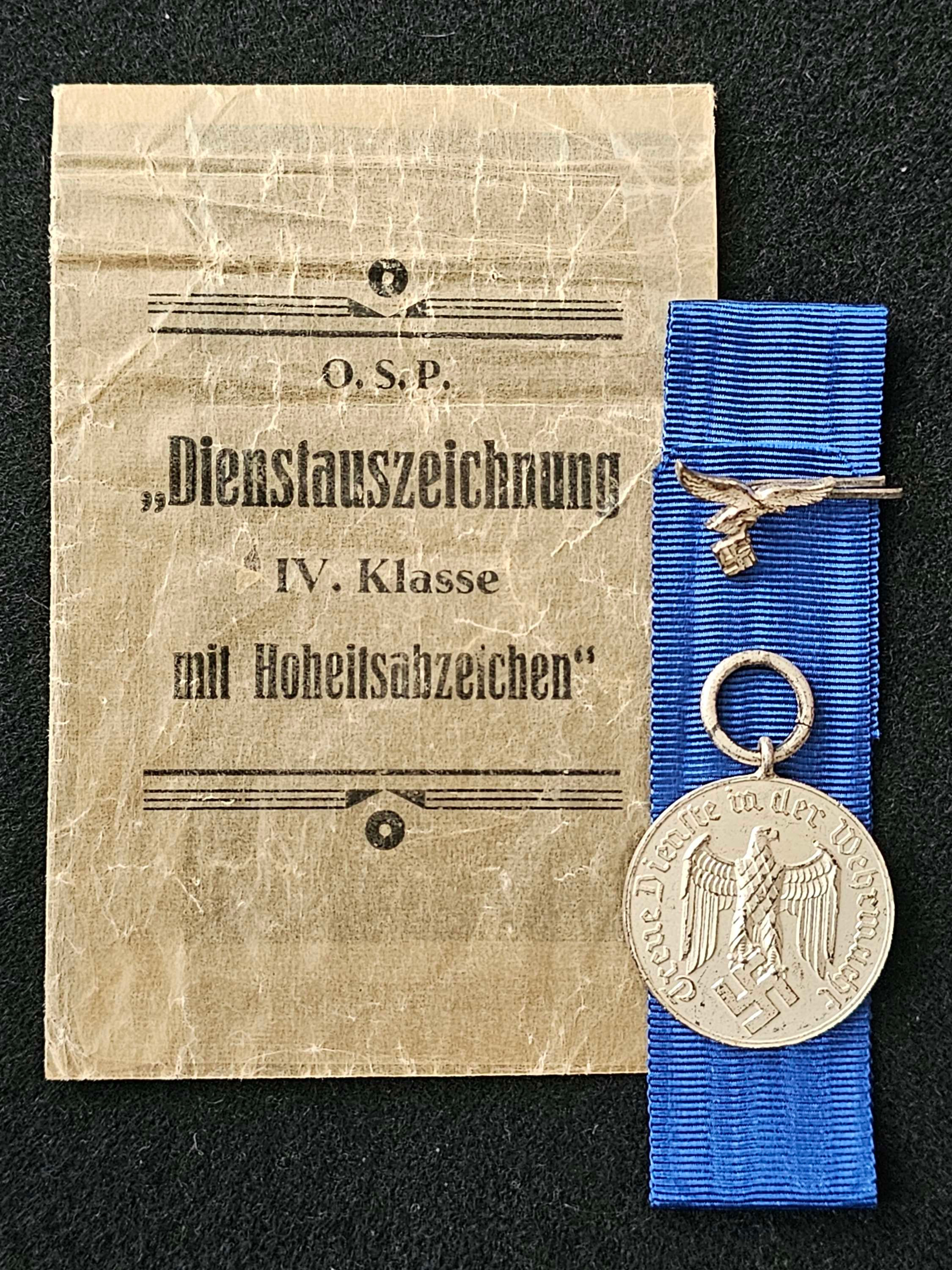 Luftwaffe 4year loyal service medal + packet and Luftwaffe attachment