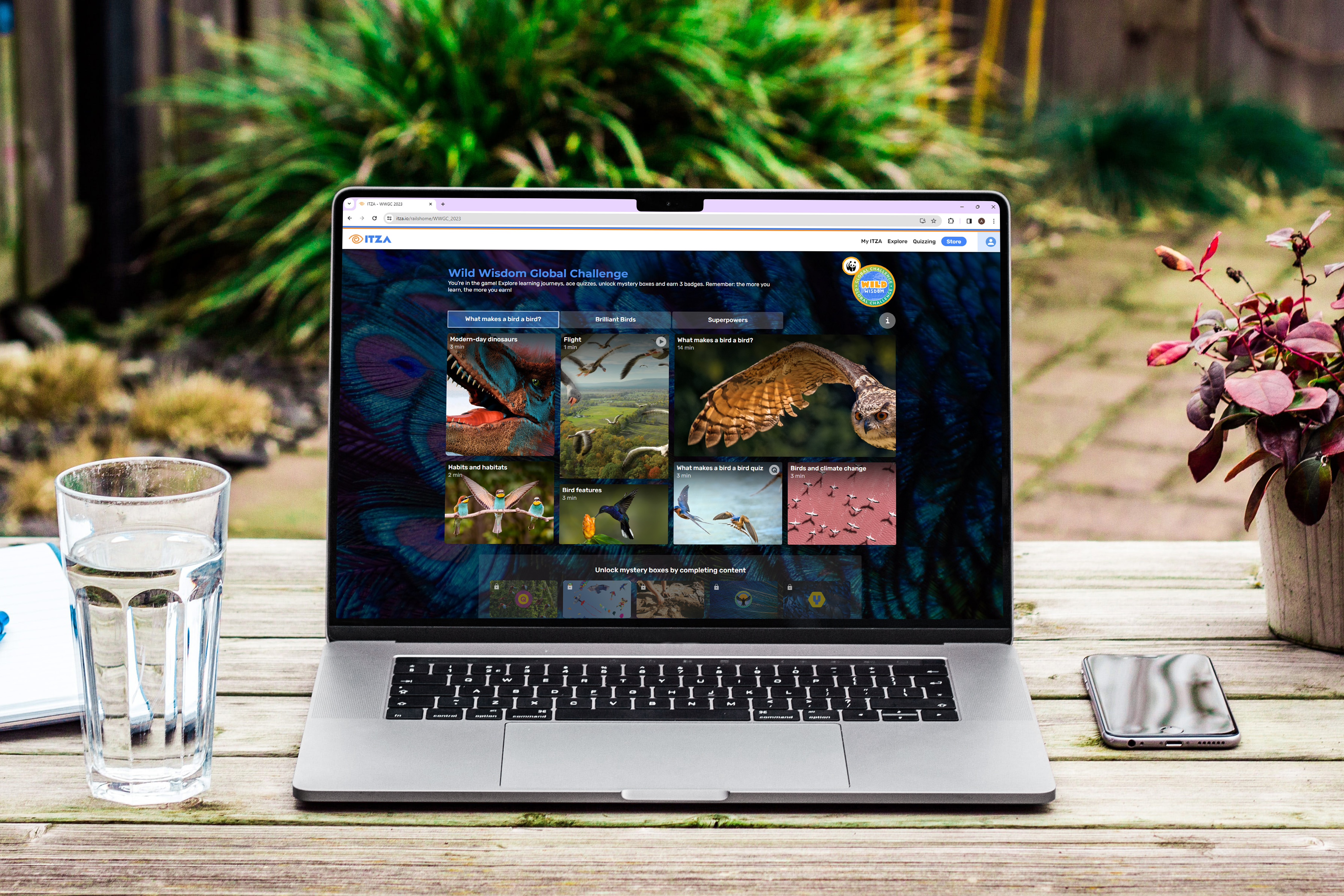 Free MacBook Pro On Wood Desk In Garden Mockup.jpg