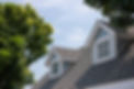 new-roof-shingles-on-gables-on-a-blue-house-1200px.jpg