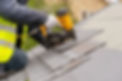 professional-roofers-installing-shingles-with-a-nail-gun-on-new-construction-1200px.jpg