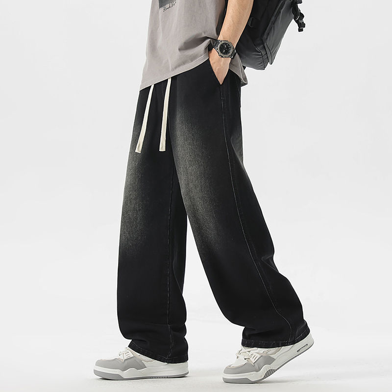 Thumbnail: Shadow Drift Wide-Leg Drawstring Jeans with relaxed wide-leg fit, elastic waistband, and washed denim finish