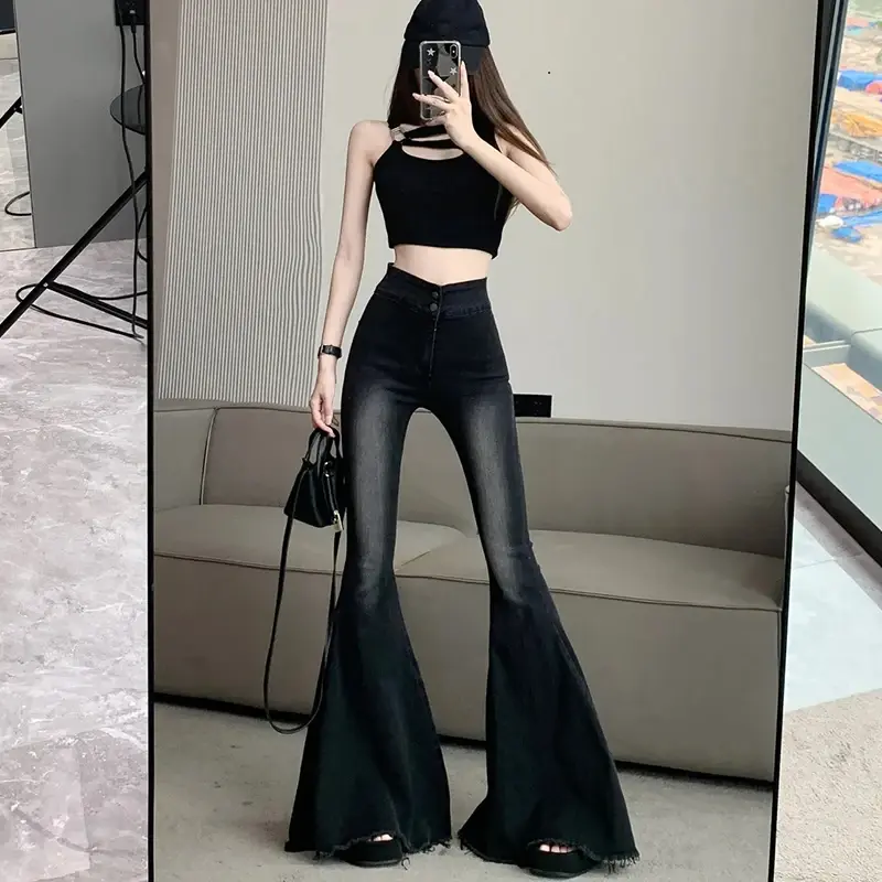 Thumbnail: Venom Flare High-Waist Bell Bottom Denim with vintage wash, slim fit, and dramatic flared leg design