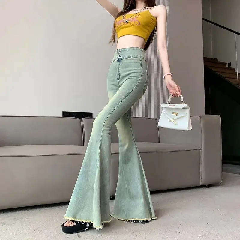 Thumbnail: Venom Flare High-Waist Bell Bottom Denim with vintage wash, slim fit, and dramatic flared leg design