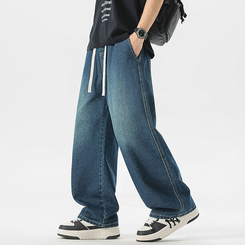 Thumbnail: Shadow Drift Wide-Leg Drawstring Jeans with relaxed wide-leg fit, elastic waistband, and washed denim finish