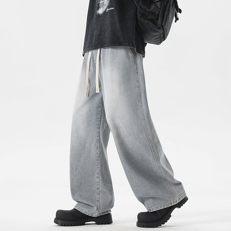 Thumbnail: Shadow Drift Wide-Leg Drawstring Jeans with relaxed wide-leg fit, elastic waistband, and washed denim finish