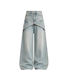 Rift Wrap Wide-Leg Denim Jeans with layered wrap waist, premium washed denim, and relaxed oversized