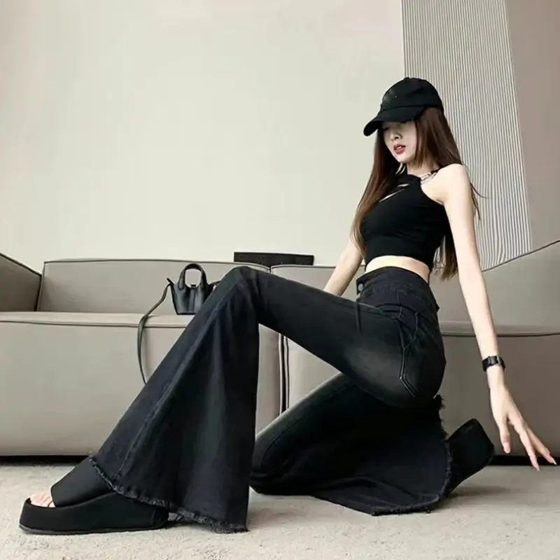 Thumbnail: Venom Flare High-Waist Bell Bottom Denim with vintage wash, slim fit, and dramatic flared leg design