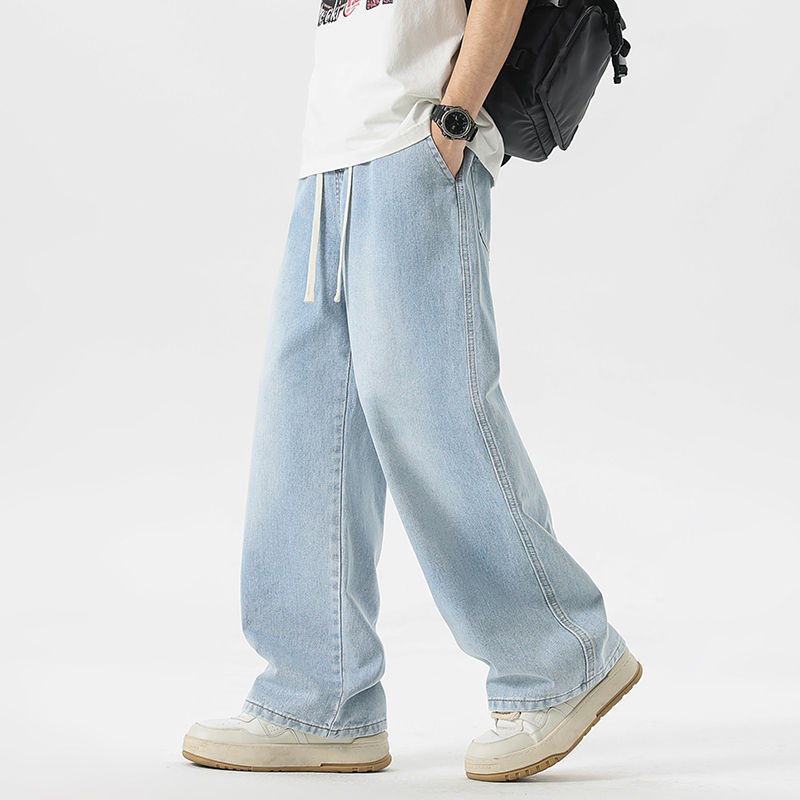 Thumbnail: Shadow Drift Wide-Leg Drawstring Jeans with relaxed wide-leg fit, elastic waistband, and washed denim finish