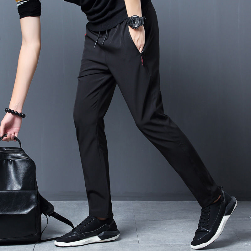 Thumbnail: Sleek Tapered Zip-Pocket Track Pants with athletic fit, zip pockets, and stretch comfort design