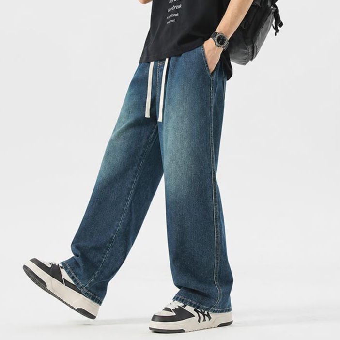 Thumbnail: Shadow Drift Wide-Leg Drawstring Jeans with relaxed wide-leg fit, elastic waistband, and washed denim finish