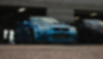 A Nissan Skyline GTR in a garage.