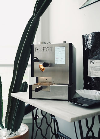 Small batch coffee roasting machine. Each batch is roasted with meticulous attention to detail to assure the best flavor qualities are retained throughout the roasting process.