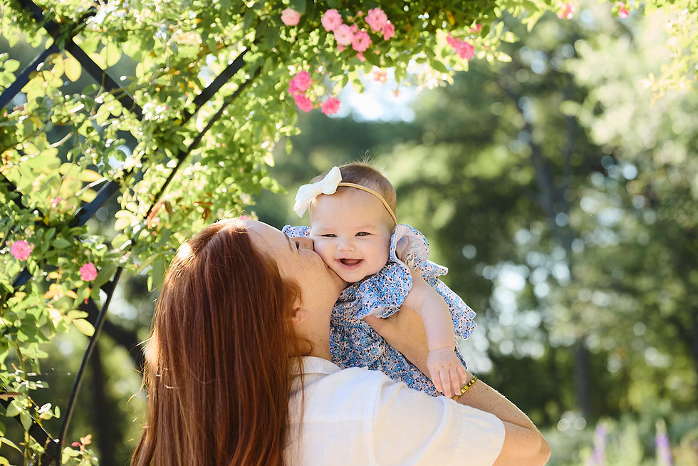 mother holding baby at Zilker Botanical Garden Austin baby photoshoot natural light