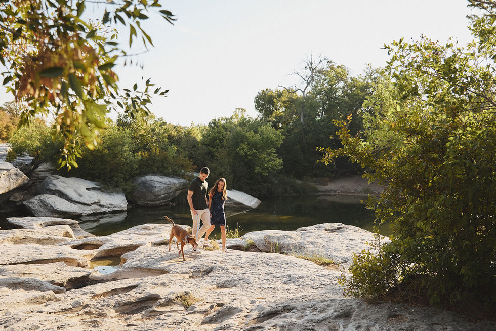 Family photo with dog at McKinney Falls Upper Falls