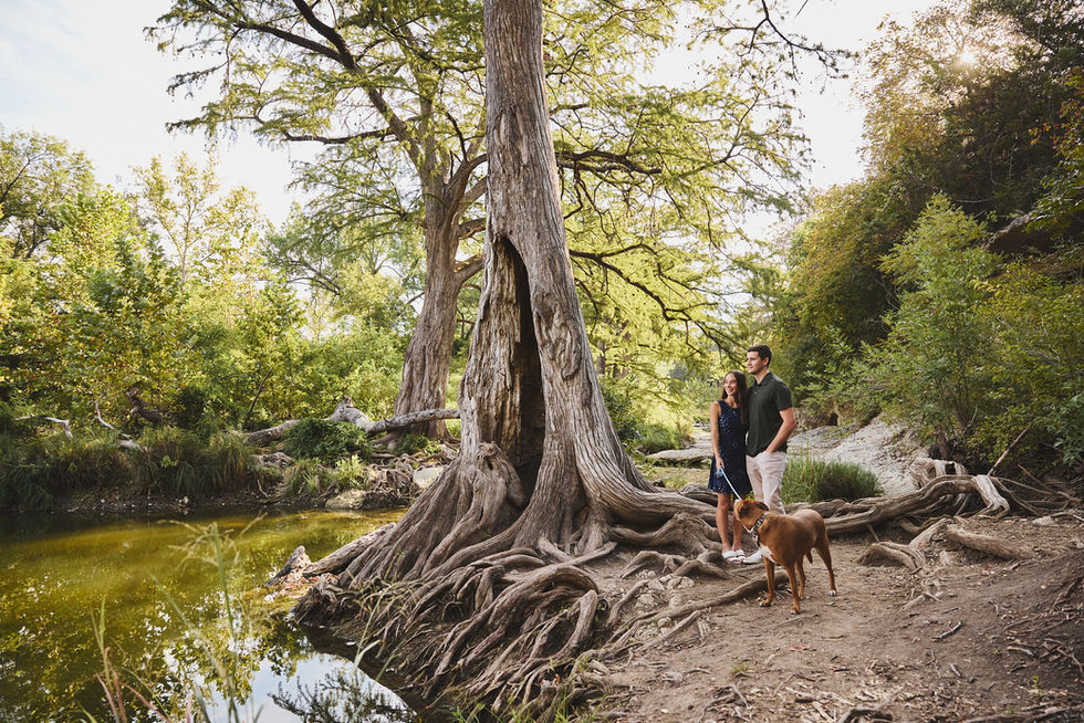 Family photo with dog at McKinney Falls Upper Falls