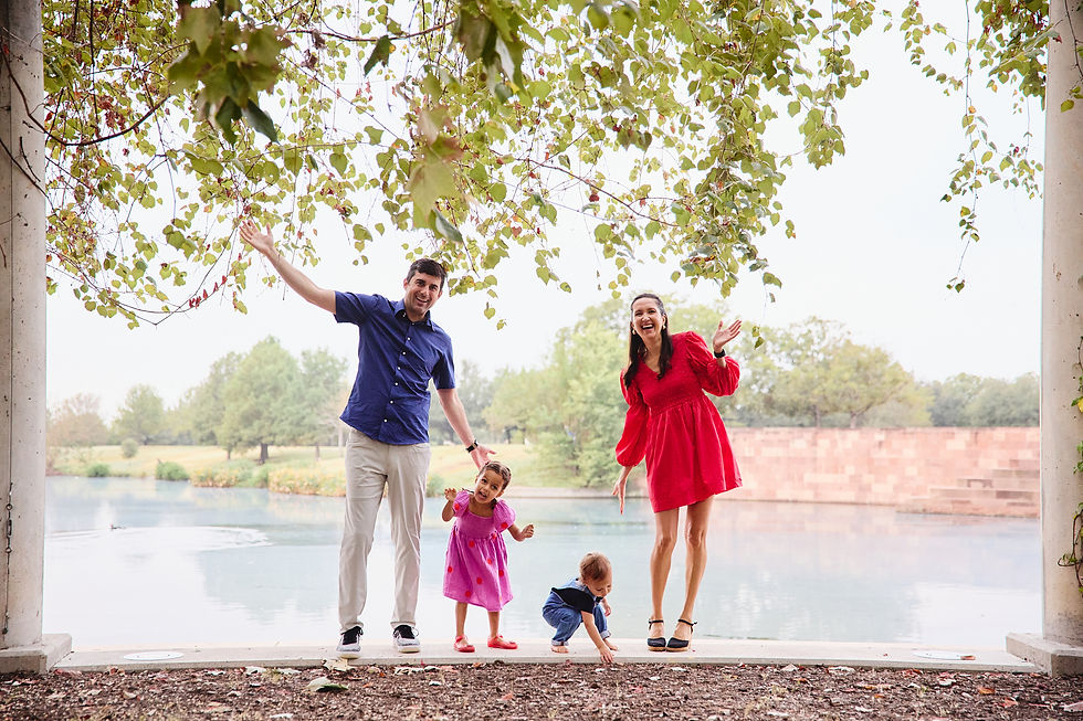 playful family photo session at Mueller Lake Park Austin with young children