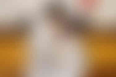 Newly married couple smiling together inside the Travis County Courthouse courtroom in downtown Austin