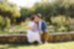 couple kissing with baby at Zilker Botanical Garden Austin family photoshoot