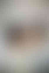 Close-up kiss of a couple outside the Travis County Courthouse in downtown Austin after their courthouse wedding