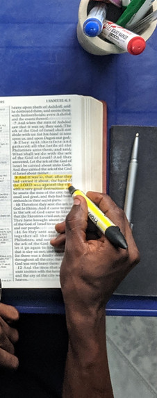 top-view-photo-of-man-reading-a-book-257