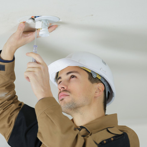 Get down from There! Why You Should Hire an Electrician to Install a New Light Fixture