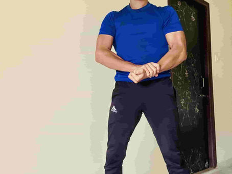 Personal trainer assisting client with high-intensity interval training (HIIT) workout for weight loss, fat burning, and improved body composition.
