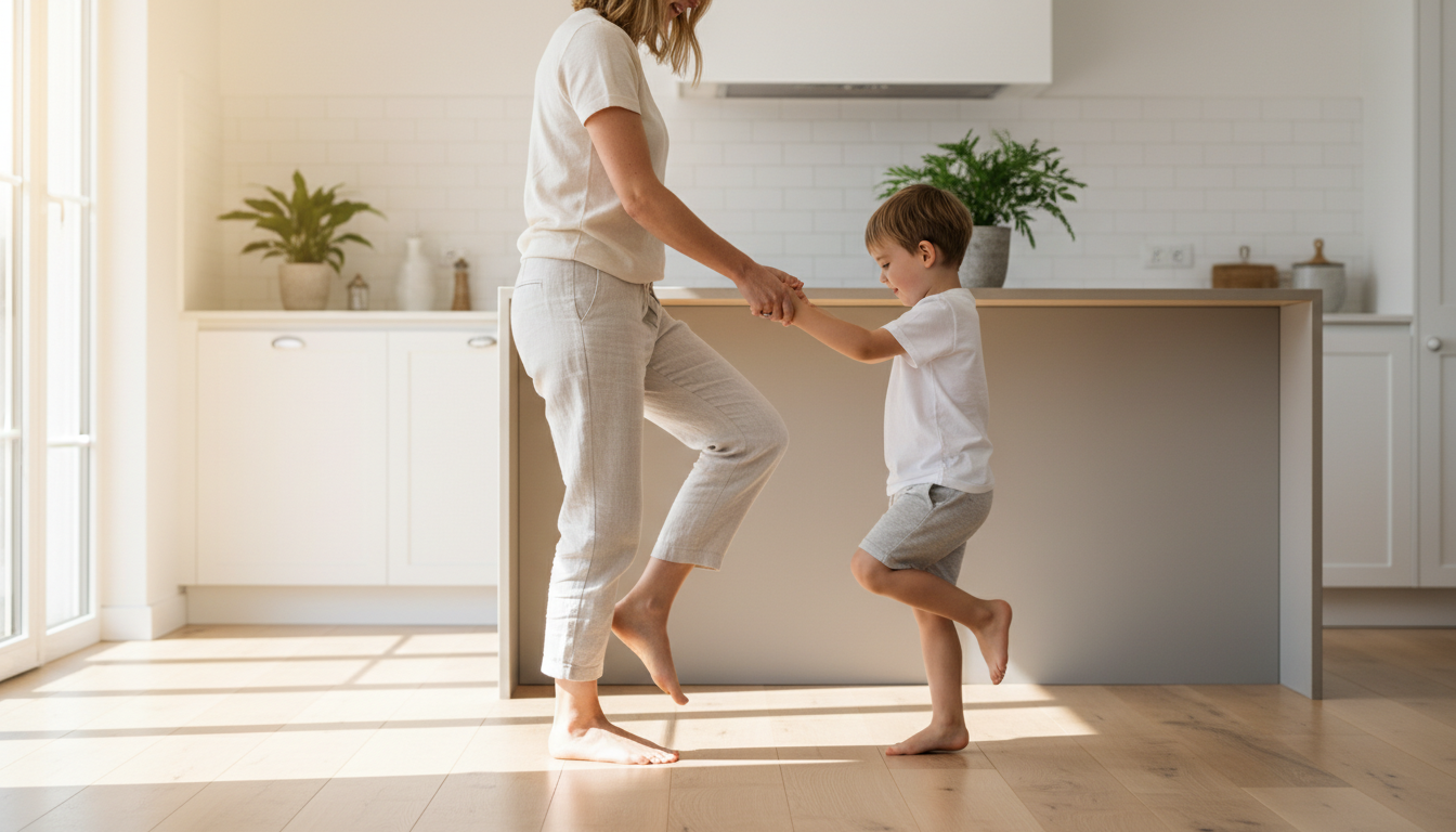 Parent and child doing heel raises barefoot