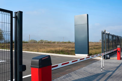 Closed automatic gate of the barrier. Automatic security system for private areas. Automat